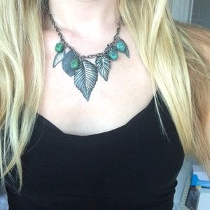 Metal leaf and stone necklace